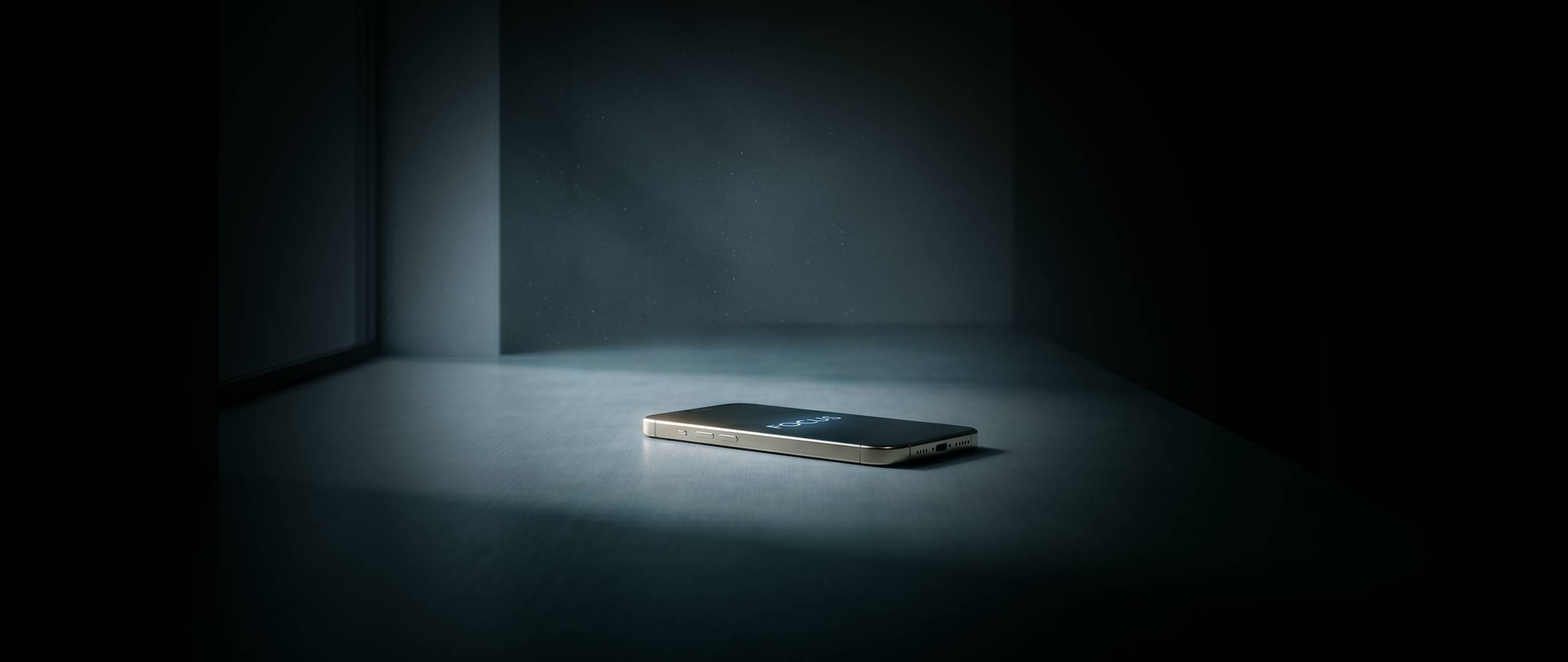 Open academic paper resting on a dark wooden desk with a phone showing a single illuminated word, a brass reading lamp casting warm light from the side, and a leather-bound notebook with handwritten notes in soft focus